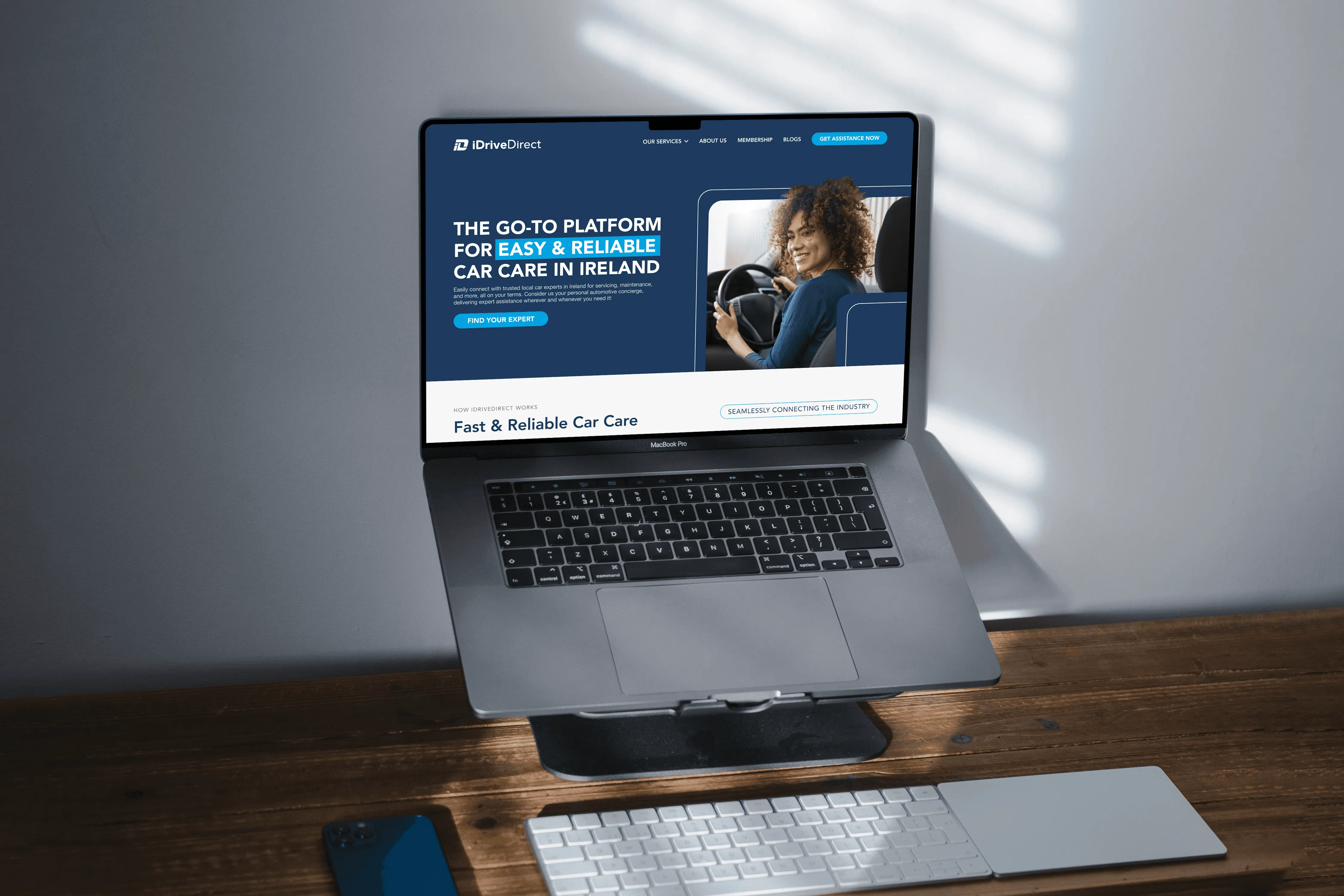 Redesigned iDriveDirect homepage on a laptop