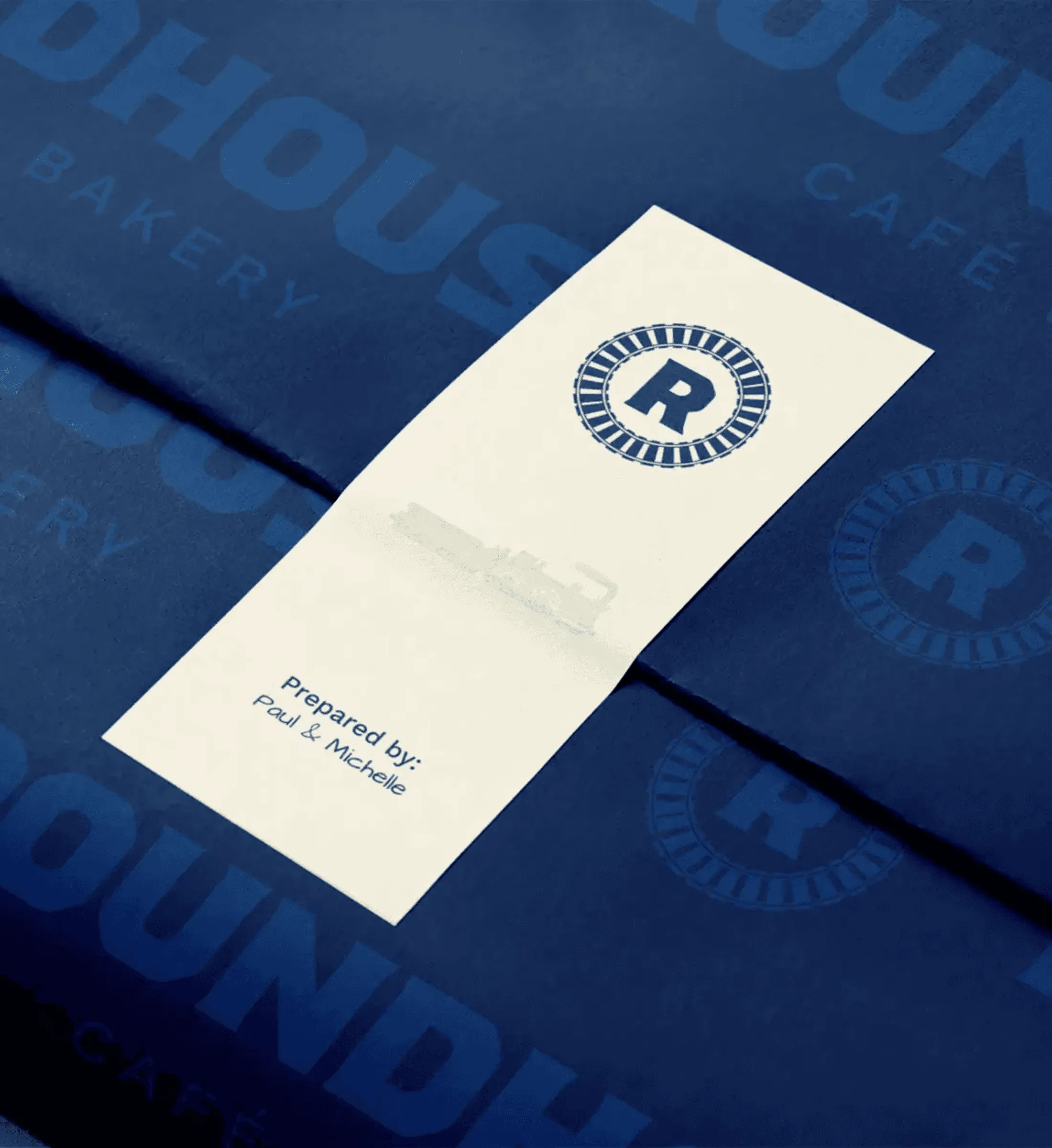 Cream Roundhouse pastry wrap on navy patterned paper